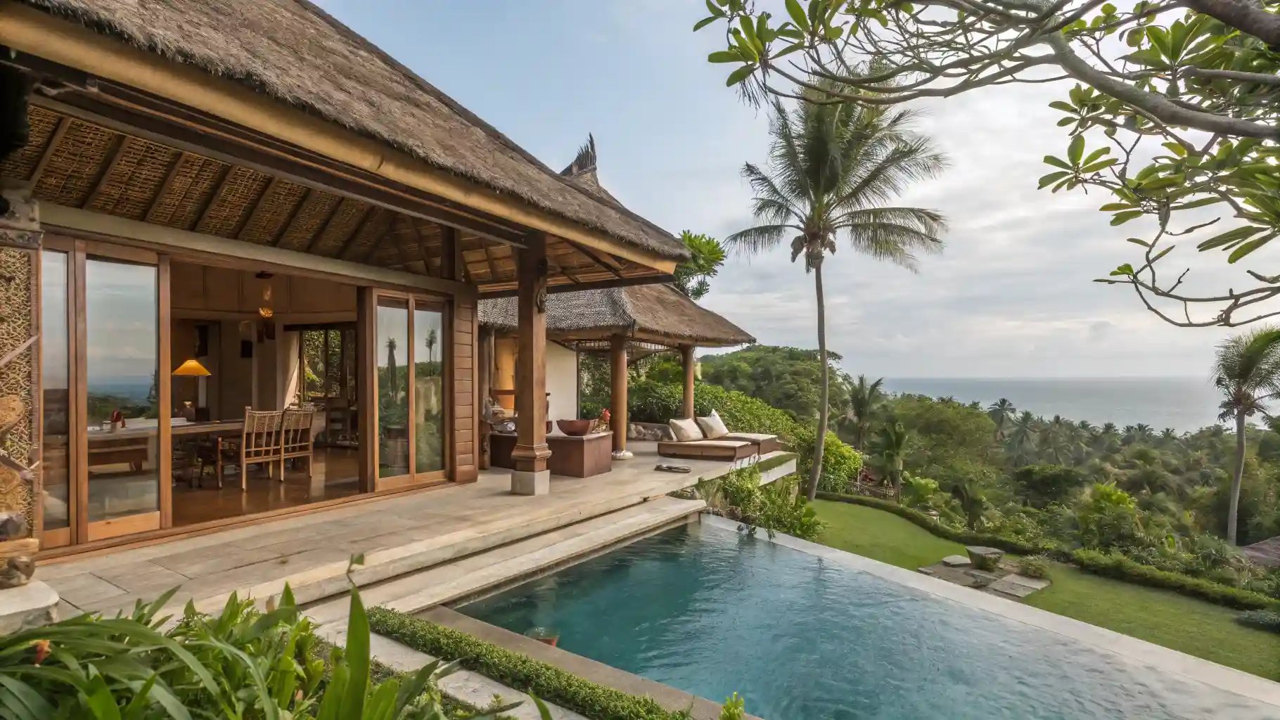 Balinese villa with infinity pool overlooking the sea